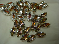 Swarovski в серебряных цапах 4200 Topaz Rainbow 15x7мм Австрия