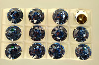 Swarovski в серебряных цапах 1200 Light Sapphire 13мм Австрия