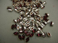 Swarovski в серебряных цапах 4200/2 Ruby 10x5мм Австрия