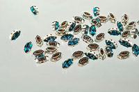Swarovski в серебряных цапах 4200/2 Blue Zircon Ice 10x5мм Австрия