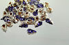 Swarovski в серебряных цапах 4300/2 Tanzanite 10х6мм Австрия