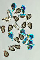 Swarovski в серебряных цапах 4300/2 Aquamarine 13х7.8мм Австрия