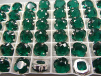 Swarovski в серебряных цапах 4470 Emerald 12мм Австрия