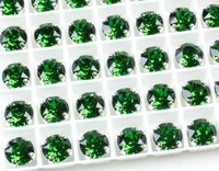 Swarovski в серебряных цапах 1088 Dark Green Xirius 7мм Австрия