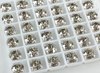 Swarovski в серебряных цапах 1088 Crystal Xirius 7мм Австрия