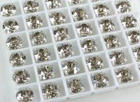 Swarovski в серебряных цапах 1088 Crystal Xirius 7мм Австрия