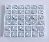 Swarovski в серебряных цапах 1088 White Opal Xirius 7мм Австрия